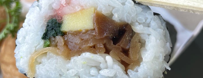 Sakae Sushi is one of Food.