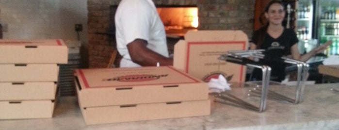 Andiamo! Brick Oven Pizza is one of สถานที่ที่ George ถูกใจ.