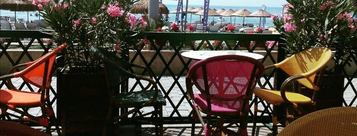 Poseidon Beach Cafe is one of Kuşadası (Mant Kırtasiye Üretimi Nwm Adisyon Fişi).