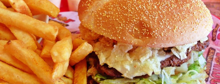 Junior Colombian Burger - South Kirkman Road is one of สถานที่ที่บันทึกไว้ของ Duren.