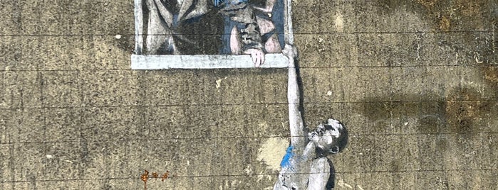 Banksy's "Well-Hung Lover" is one of Bath, Bristol, Sheffield.