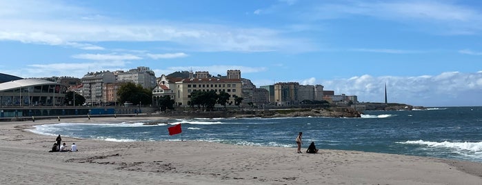 Praia de Riazor is one of Hoteles y Más.