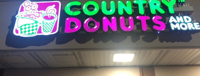 Country Donuts is one of สถานที่ที่ Joseph ถูกใจ.