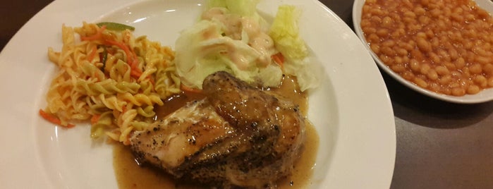Kenny Rogers Roasters is one of Locais curtidos por Charles.