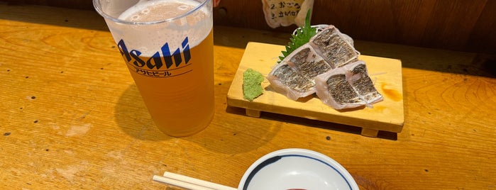 魚寅食堂 蒲田店 is one of Locais curtidos por Sigeki.