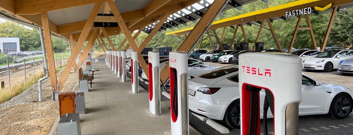 Tesla Supercharger is one of Clive’s Liked Places.