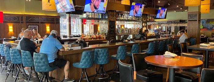 Bar Louie is one of Places to try.