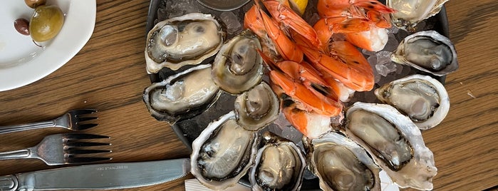 Taylor Shellfish Oyster Bar is one of Home Specialties.