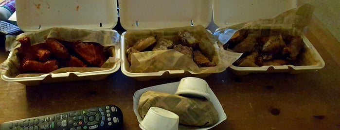 Wingstop is one of The 7 Best Places for Garlic Parmesan in Raleigh.