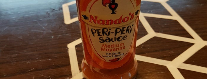 Nando's is one of Locais curtidos por Joe.