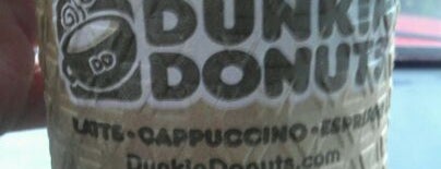 Dunkin' is one of Locais curtidos por Rick E.