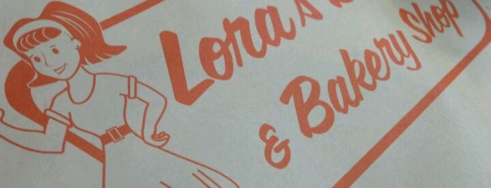 Lora's Donuts and Bakery is one of Tempat yang Disukai Robert.