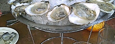 John Dory Oyster Bar is one of Top 10 for Raw Oysters.