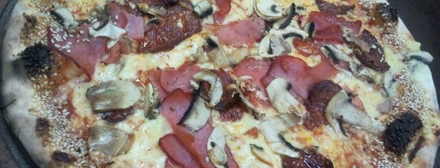 Sach Pizza is one of Tempat yang Disukai Alban.