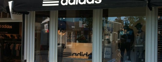 Adidas Outlet Store is one of Locais curtidos por Dennis.