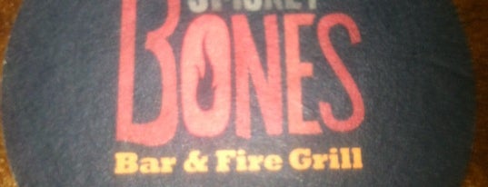 Smokey Bones Bar & Fire Grill is one of Dan : понравившиеся места.