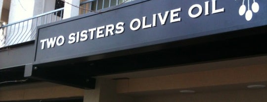 Two Sisters Olive Oil is one of สถานที่ที่ Evie ถูกใจ.
