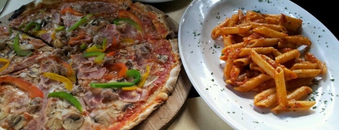 Trattoria, italian restaurant jl.oberoi is one of Bad Service/ Bad Attitude/ Bad Food/ Bad Price!!.