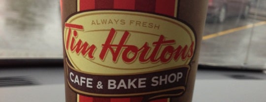 Tim Hortons is one of สถานที่ที่ Kat ถูกใจ.