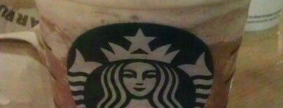 Starbucks is one of Locais curtidos por Ric.