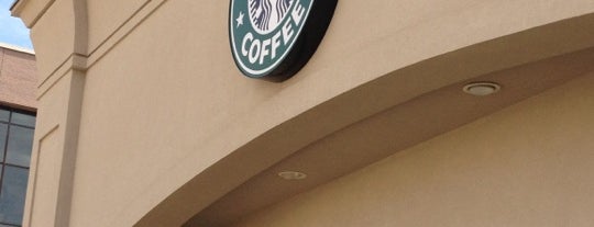 Starbucks is one of Lieux qui ont plu à Rhonda.