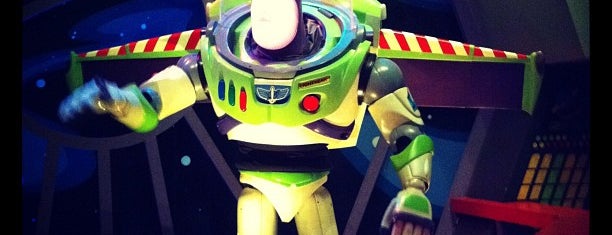 Buzz Lightyear's Space Ranger Spin is one of Disney World/Islands of Adventure.
