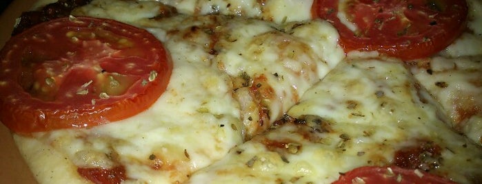 Smokin Joe's Pizza is one of Lugares favoritos de Kunal.
