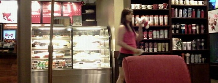 Starbucks is one of Orte, die Cristina gefallen.