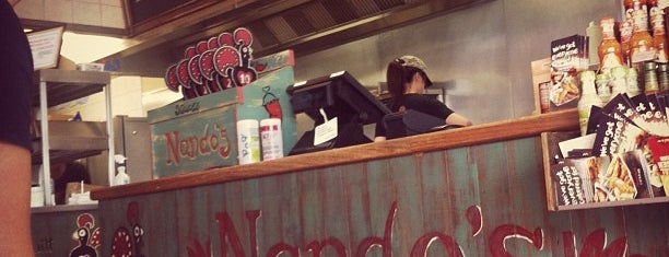 Nando's is one of Locais curtidos por Scott.