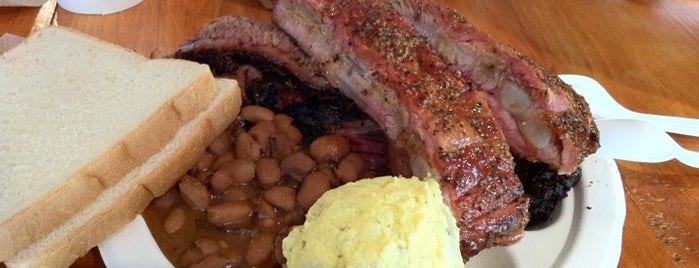 Franklin Barbecue is one of Slidin' down E 11th St....