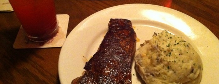 Outback Steakhouse is one of Lugares favoritos de Eve.