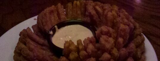 Outback Steakhouse is one of Lieux qui ont plu à Mike.