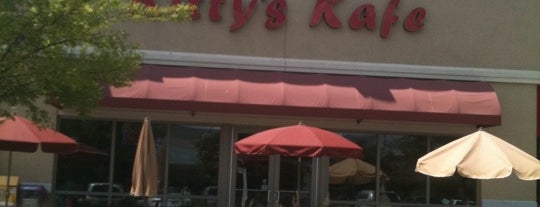 Kitty's Kafe is one of สถานที่ที่ Tyra ถูกใจ.