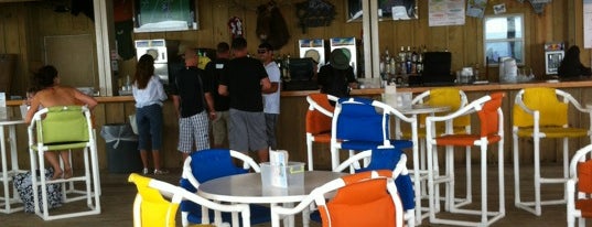 Clayton's Beach Bar And Grill is one of Posti che sono piaciuti a John.