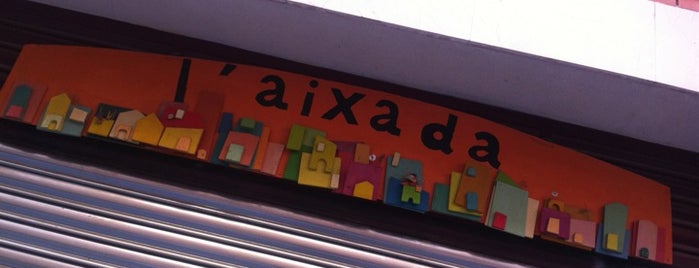 L'Aixada is one of สถานที่ที่ Marta ถูกใจ.