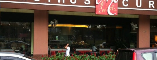 Muthu's Curry Restaurant is one of สถานที่ที่ Erik ถูกใจ.