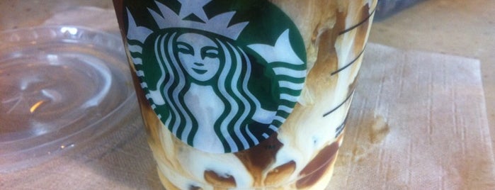 Starbucks is one of Locais curtidos por Doug.