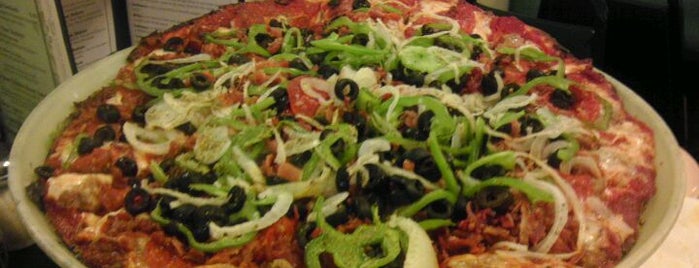 Fortel's Pizza Den is one of สถานที่ที่บันทึกไว้ของ Thomas.