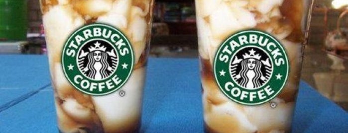 Starbucks is one of สถานที่ที่ Edgar Allen ถูกใจ.