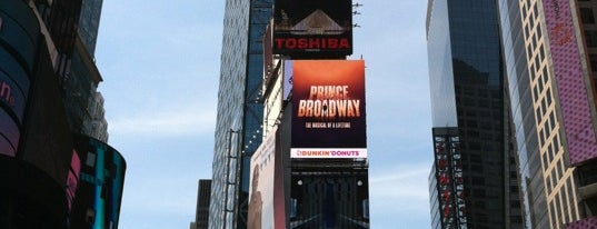 Dunkin' Times Square Billboard is one of NYC places to go.