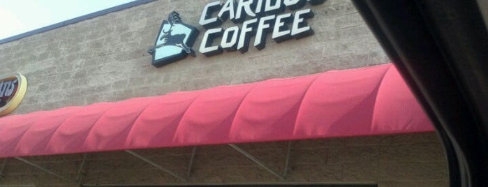 Caribou Coffee is one of สถานที่ที่ eryn ถูกใจ.