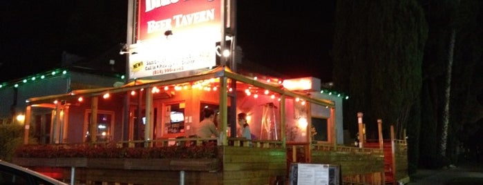 The Blue Dog Beer Tavern is one of Tempat yang Disukai July.