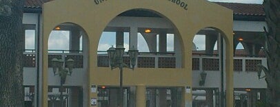 University High School is one of Tempat yang Disukai John.