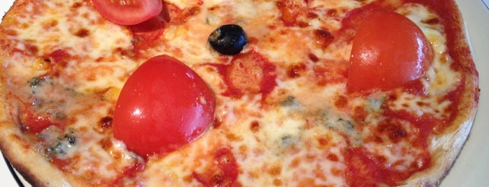 Pizza Express is one of Locais curtidos por Mike.