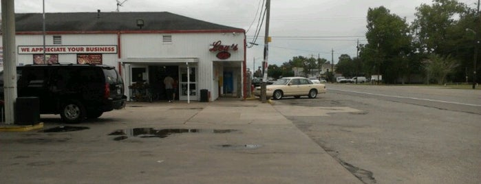 Lou's Market is one of ESTHER’s Liked Places.