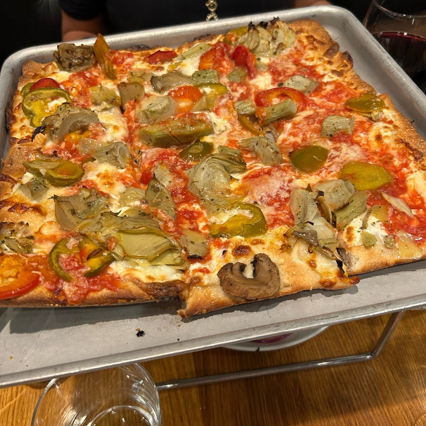 Adrienne's Pizzabar - Pizzeria,Italian Restaurant - bar,pizza,cheese,salads,well,lunch,town,pizzeria,city,outdoor seating,liquor,dinner,crowded,fresh food,great value,potatoes,happy hour,cute,peppers,sausage,garlic,mushrooms,onions,island,delivery,good for dates,spinach,Christmas,eggplant,basil,vodka,broccoli,tequila,pepperoni,benches,calzones,good for groups,arugula,scallions,Moscow Mule,ginger beer,lime juice,carafes,black olives,white pies,fashioned square,nutella chocolate cake