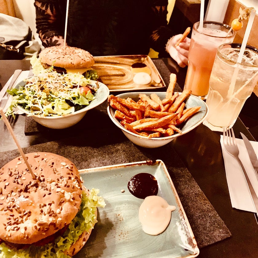 HANS IM GLÜCK Burgergrill & Bar - Bar,Burger Joint,Vegan and Vegetarian Restaurant - restaurants,good service,burgers,salads,healthy food,liquor,crowded,great value,oranges,mustard
