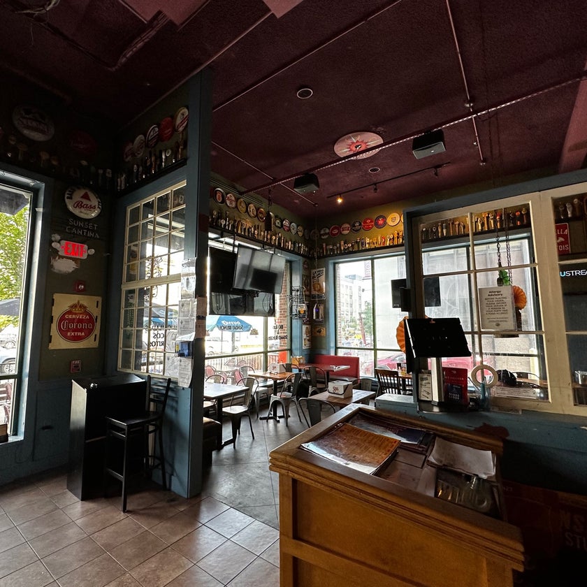 Sunset Cantina - Sports Bar,American Restaurant,Tex-Mex Restaurant,Mexican,Sports Bars,American - meats,chicken,beer,Mexican food,sunsets,lunch,chocolate,bread,spicy food,outdoor seating,dinner,crowded,great value,ribs,buffet,avocado,margaritas,nachos,mango,coconut,quesadillas,sangria,lime,mayonnaise,tequila,trivia,sour cream,good for groups,pomegranate,good for special occasions,birthday cakes,spinach dip,artichoke dip,cobbler,swordfish,crema,chives,cream soda,summer drinks,Southern Tier