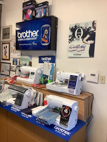 Factory Sewing Machine And Sweeper Company Logo