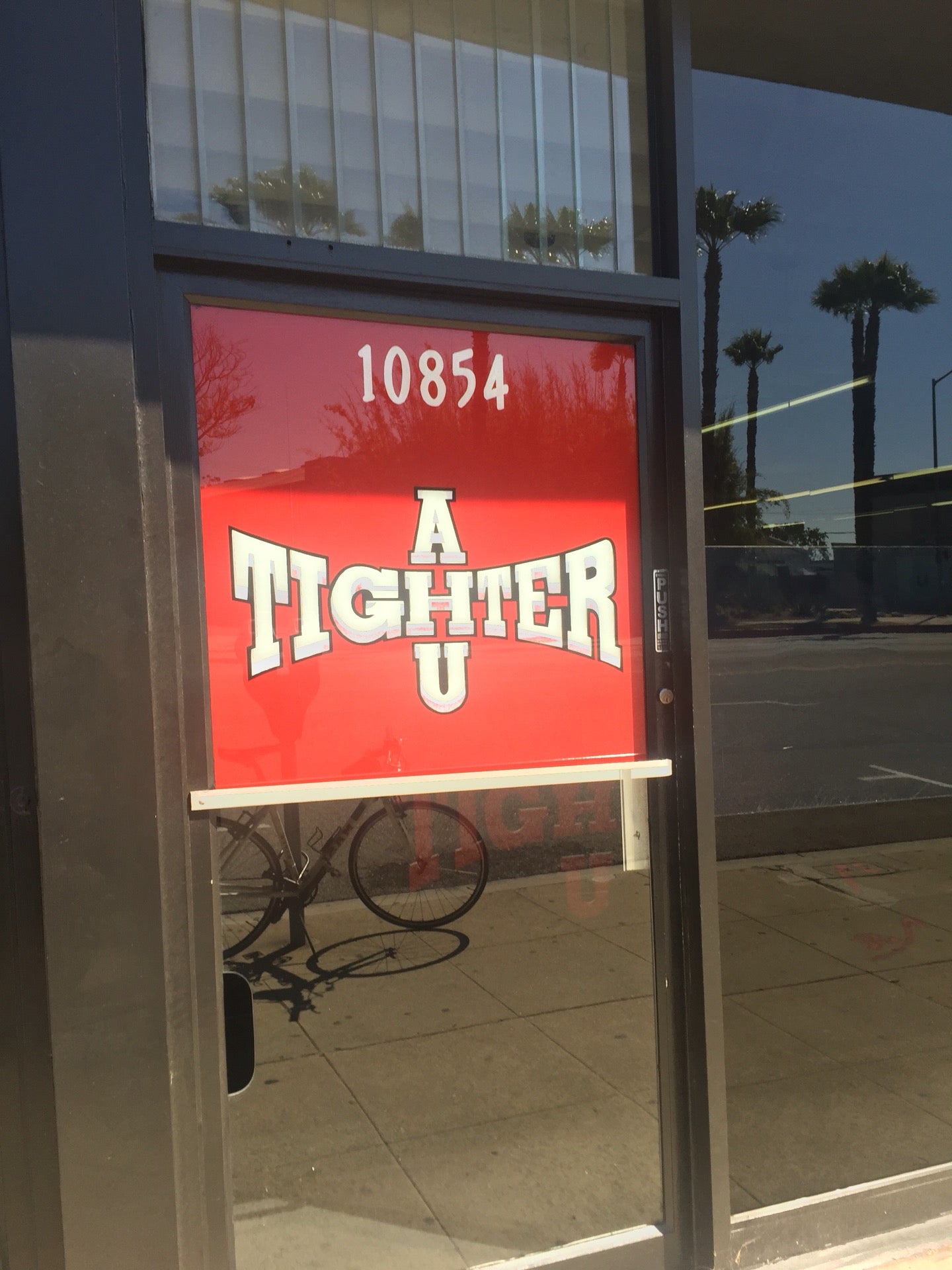 A Tighter U cover photo